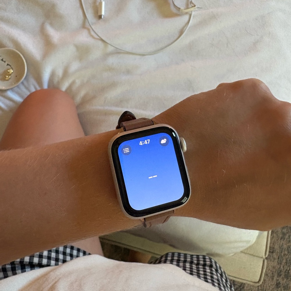 Apple Smartwatch SE with brown band